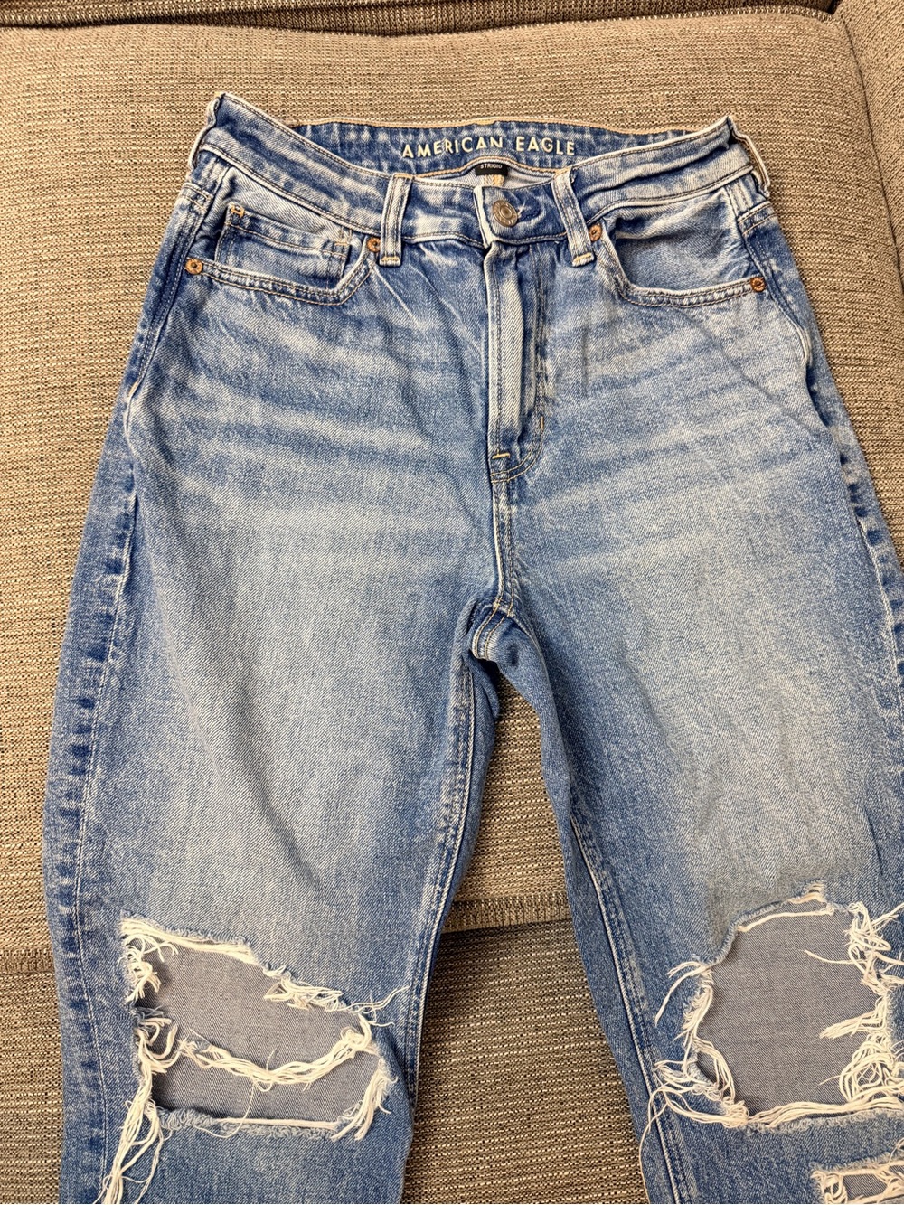 American Eagle Outfitters Light Blue High-Rise Distressed Jeans